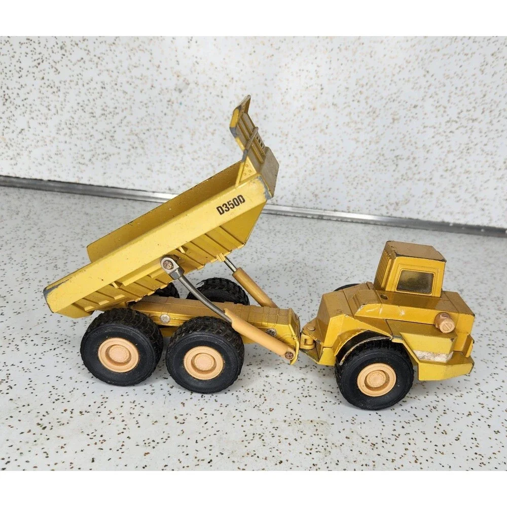 Ertl Mighty Movers 2431 1:50 Caterpillar D350D Articulated Dump Truck Die-Cast